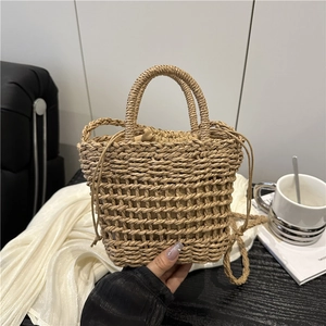 Women's Summer Hollow Woven Straw Bucket Bag Fashion Casual Flower Charm Drawstring Crossbody Shoulder Handbag For Vacation