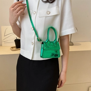 Metallic green croc-effect mini handbag with top handle and crossbody strap for women