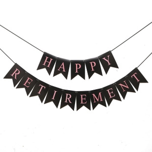 Detail of Happy Retirement swallowtail bunting banner with pink letters on black cardstock