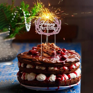 Pink rhinestone Happy Birthday cake topper with elegant reindeer antler design