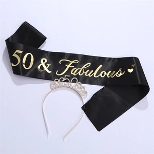 Close-up of 50 & Fabulous black satin sash and sparkling 50th rhinestone tiara