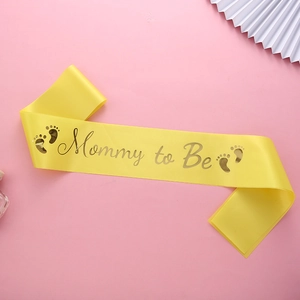 Silky yellow Mommy to Be sash with gold lettering for baby shower party decoration