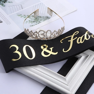 Close-up of silver crystal crown with number 30 and black 30 & Fabulous birthday sash
