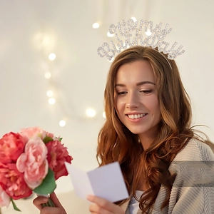 Elegant It's my birthday rhinestone headband worn by a woman at a birthday party