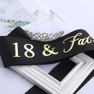 Detailed view of 18th birthday set with silver crystal tiara and black 18 & Fab sash