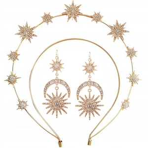 Detail view of gold celestial headpiece with star and moon earrings set with rhinestones