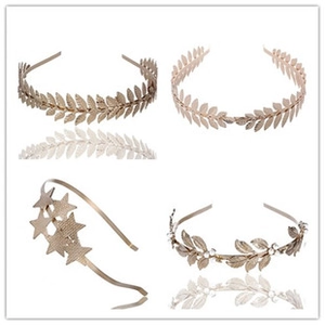 Detail of four golden metal headbands with leaf, star, and rhinestone pearl designs