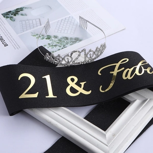 Detail of 21st birthday set with black glitter sash and silver rhinestone tiara crown