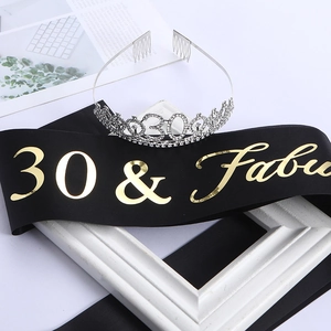 Detail of silver crystal number 30 crown and black gold 30 & Fabulous sash set