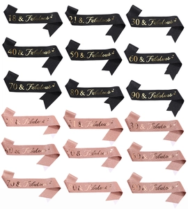 Selection of birthday sashes in black and rose gold with ages eighteen to ninety