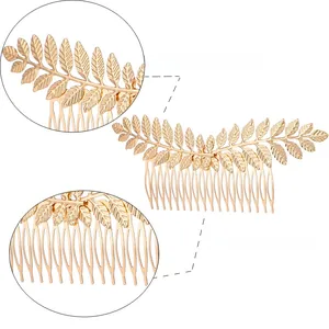 Detailed view of golden leaf bridal hair comb with polished texture and metal teeth