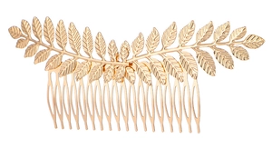 Macro shot of 15-tooth golden leaf bridal hair comb showing detailed leaf veins and texture
