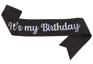 Detail of black glitter birthday sash with holographic It's my Birthday lettering