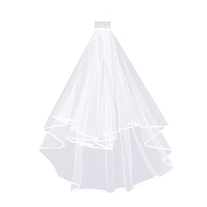Close-up of double-layered white bridal veil with satin edges and a clear hair comb attachment
