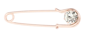 Detailed view of rose gold safety pin brooch with a large round white zircon stone