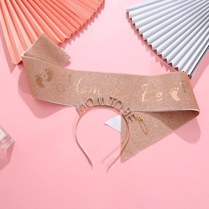 Rose gold Mom to Be baby shower set with rhinestone tiara, glitter sash, and safety pin