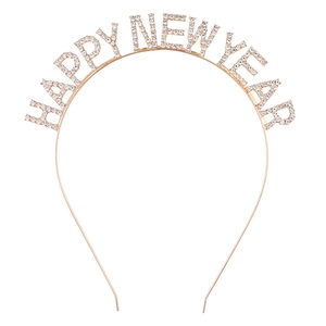 Detail of gold metal headband featuring sparkling rhinestone Happy New Year lettering