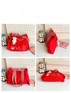 Four-angle view of red nylon tote bag with apple prints and white bear keychain