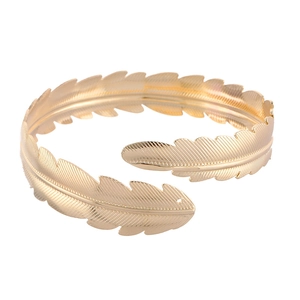Baroque style gold feather arm cuff bracelet with detailed metal textures and open design