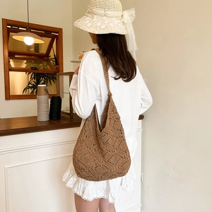 Chic brown hand-woven knit tote bag with hollow diamond pattern in bohemian style