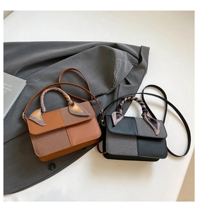 Detail of elegant small square crossbody bag featuring tweed patchwork and silk scarf wrap