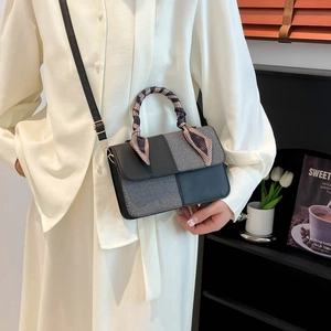 Minimalist patchwork crossbody bag with gray plaid fabric and silk scarf handle detail