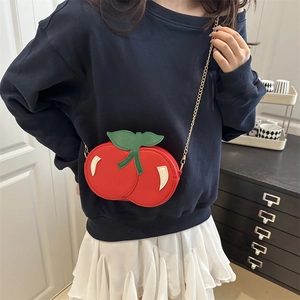 Creative cherry-shaped red crossbody bag with green leaf detail and gold chain strap