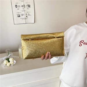 Elegant gold woven leather envelope clutch bag with metallic finish for women in summer