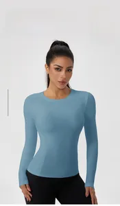 Detail of smog blue long-sleeve yoga top featuring moisture-wicking and high-elastic fabric