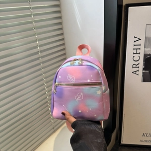 Mini nylon backpack with pastel purple gradient, star patterns, and floral zippers