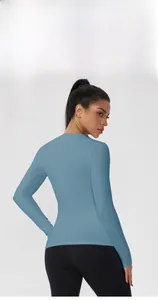 Detail showing the slim-fit back design and stretchy fabric of this navy yoga shirt
