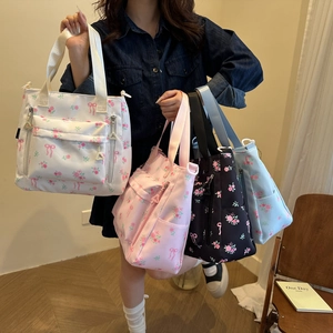 Floral multi-pocket tote bag shown in four colors for sweet summer commuting style