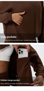 Detailansicht der Seitentaschen und der versteckten Innentasche der braunen Yoga-Jacke