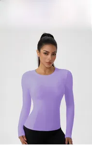 Detail view of purple tight-fitting yoga top with moisture-wicking and quick-dry fabric