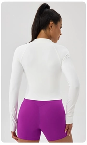 Close-up of slim-fit athletic jacket back view with curved seams and stand collar