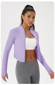 Detail of lavender yoga jacket featuring functional thumbholes and a slim fit design