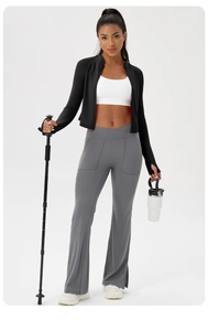 Full view of women's yoga set featuring flared leggings with stylish crossover waist