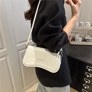 Chic white underarm shoulder bag with curved design and Fashion & Bags gold hardware