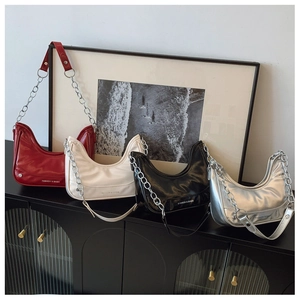 Showcase of four trendy hobo bags in red, beige, black, and silver with chain straps