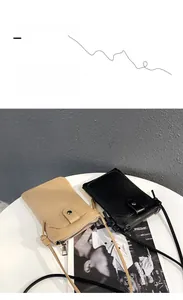 Detail of lychee pattern faux leather texture on black and coffee crossbody phone bags