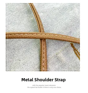 Close-up of brown leather strap with lychee texture and white stitching on a phone bag