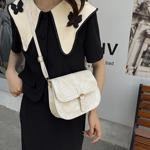 Retro cream faux leather saddle bag with vintage texture and adjustable shoulder strap