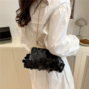 Chic black sequin cloud bag with gold ring handle and chain strap for evening events