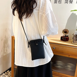 Chic black litchi texture vertical crossbody phone bag with zipper and leather strap
