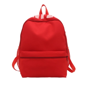 Minimalist red nylon school backpack with side mesh pockets and front zipper pocket