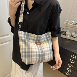 Plaid canvas crossbody bag with wide jacquard strap and fashion leather patch detail