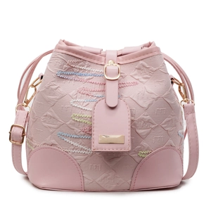 Pink drawstring bucket bag with quilted embroidery and adjustable shoulder strap