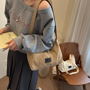 Minimalist nylon tote bag for women in khaki and white colors with shoulder straps