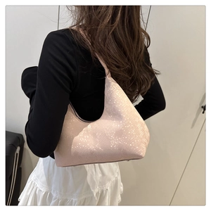 Detail view of pink snakeskin faux leather shoulder bag with Fashion Bags logo print