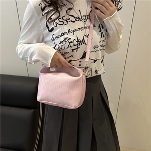 Pink frosted square handbag with vertical stripes and detachable crossbody strap